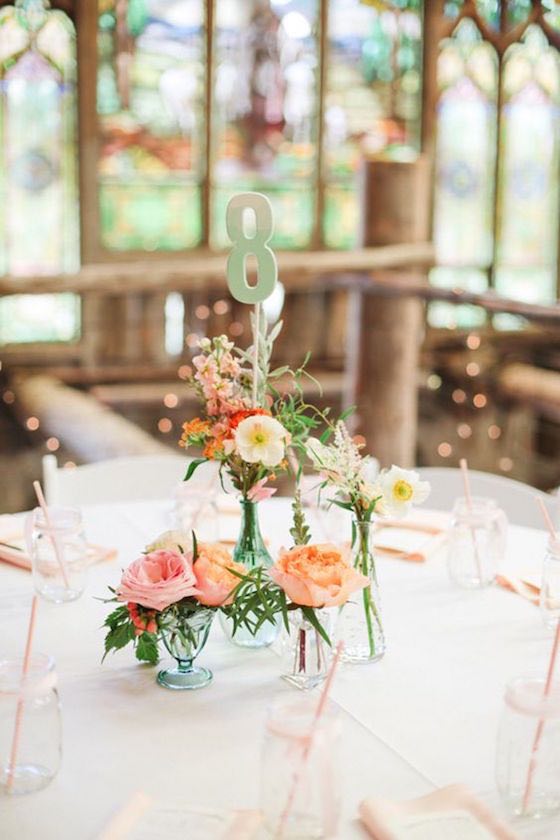 Cute DIY wedding flower centerpiece idea. A whimsical boho barn wedding in Colorado by Connie Whitlock Photography.