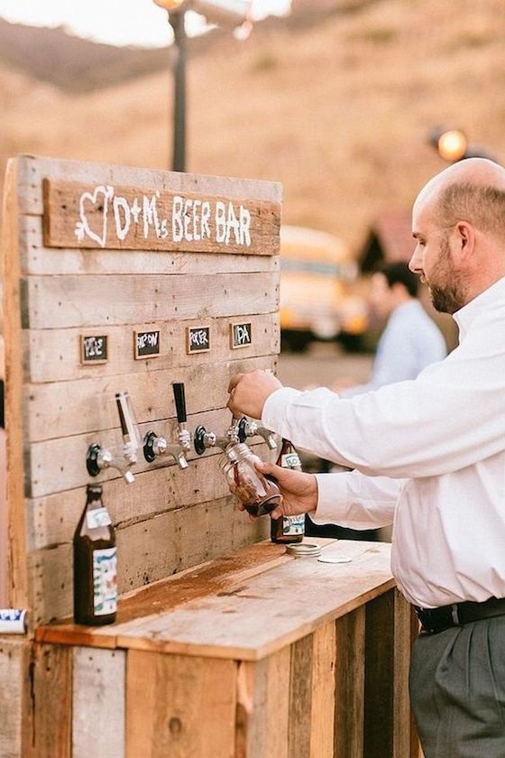 If you're planning a barn wedding, a stylish drink station will get guests mingling while also doubling as decor.