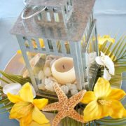 Lemon yellow beach wedding centerpiece.