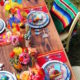 Mexican Fiesta inspired in Frida Kahlo with Sarapes, Talavera dishes, maracas, papel picado and paper flowers.