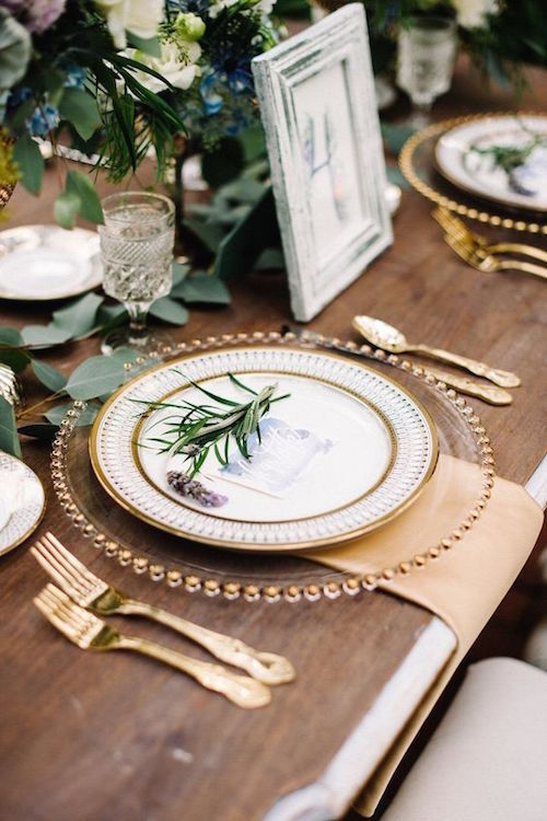 Chic modern wedding reception table setting in dusty blue and lavender on this French wedding inspired theme dripping with romantic details. Photo: Best Photography.