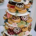 A sweet backyard garden party wedding in Utah with a doughnut tower as a wedding cake by Ali Sumsion Photography.