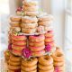 Scrumptious vintage doughnut wedding cake. Add frosting, roses, baby's breath and some greenery. Photo by Emily Sacra Photography.