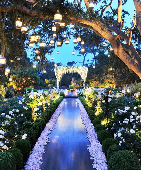 Go over the top with your wedding entrance and create an enchanted garden where no forest exists.