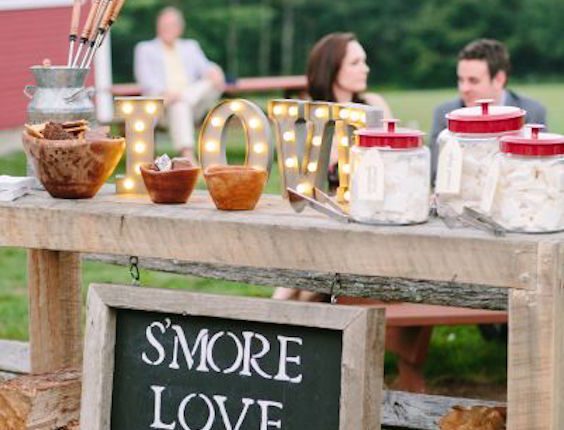 Interactivity is a must at weddings. Why not let your guests pack a few S'mores just they way they like them? Wedding photography: Stacey Hedman.