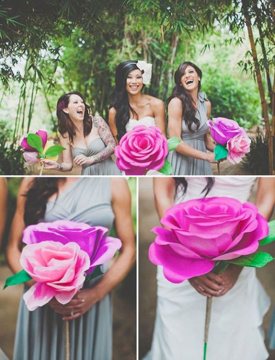 If you cannot part with the idea of a flowers but still want to save some money, check out this impossibly fun wedding idea. Bright pink paper flower bouquets.