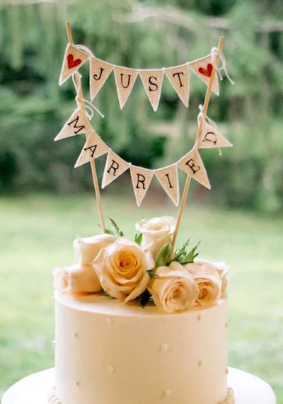 Tiny banners with twine are a great choice for rustic weddings. Photographer: 52Forty Photography Cake by Jeffery A. Miller Catering.