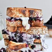 Fontina, blackberry & basil smash grilled cheese sandwiches. They'll disappear before you can say cheese!