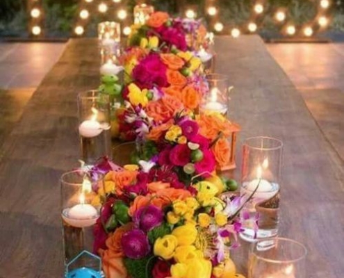 Stunning runner made of floral centerpieces.