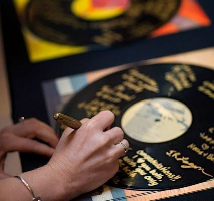 Go ultra vintage. Grab a few records and gold sharpies. They can be framed afterwards to decorate your walls. Photography: Sarelle photos.
